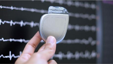 Implantable cardioverter-defibrillator (ICD) device held in hand