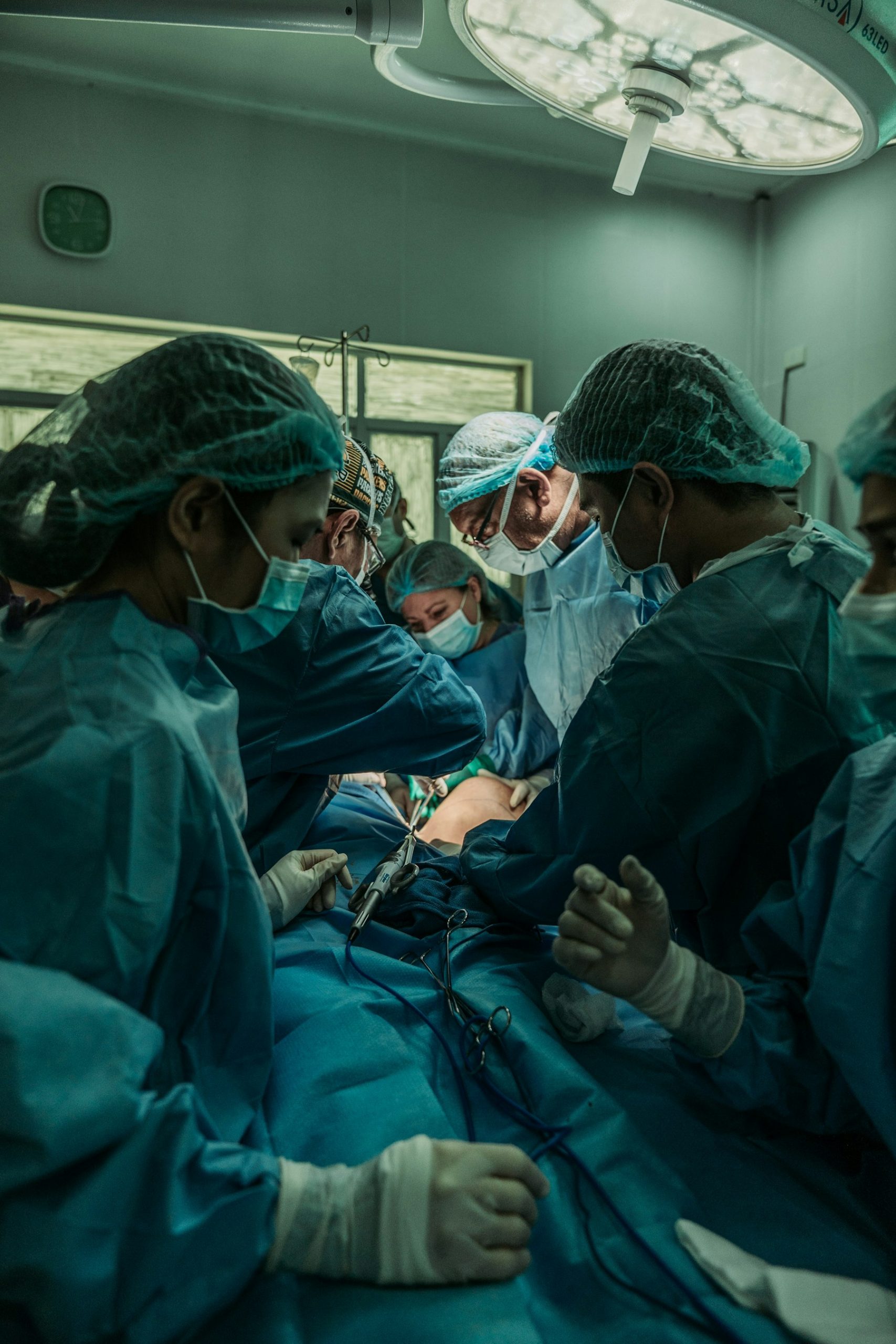 Surgical team working together in a cardiac operating room
